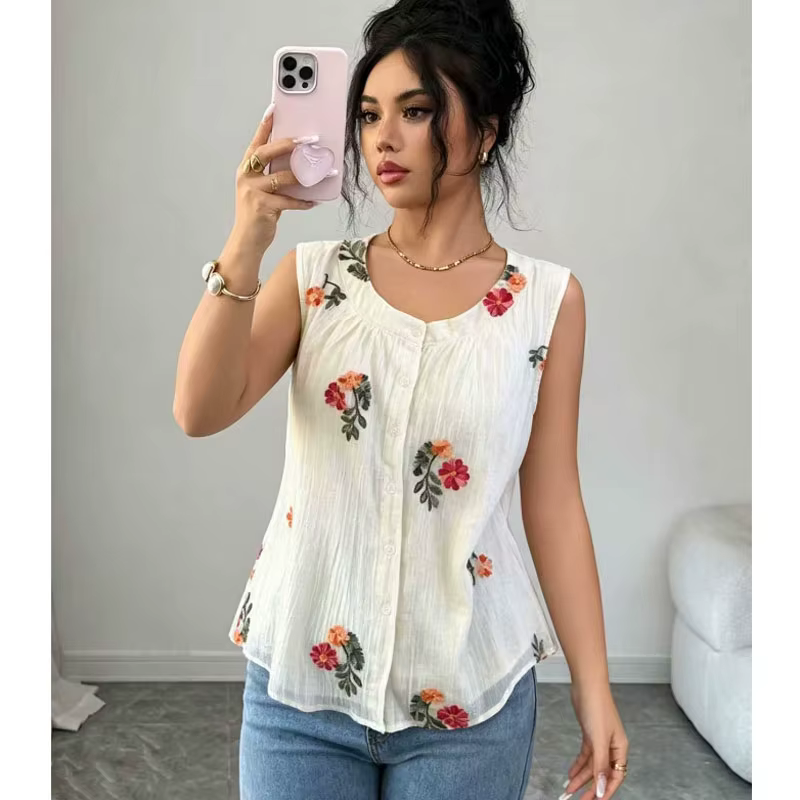 Nouvelle Blouse d'été sans manches à col rond brodée pour femme
