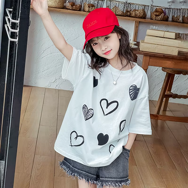 T-shirt Fille Été 2026 Décontracté Mignon Imprimé Cœur Manches Courtes T-shirt Ample Confortable Vêt