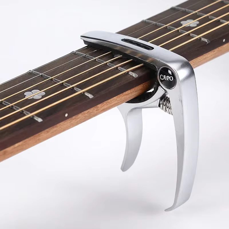 Capodastre de guitare en métal, 1 pièce, pince d'accordeur de guitare en alliage de Zinc, déclencheu