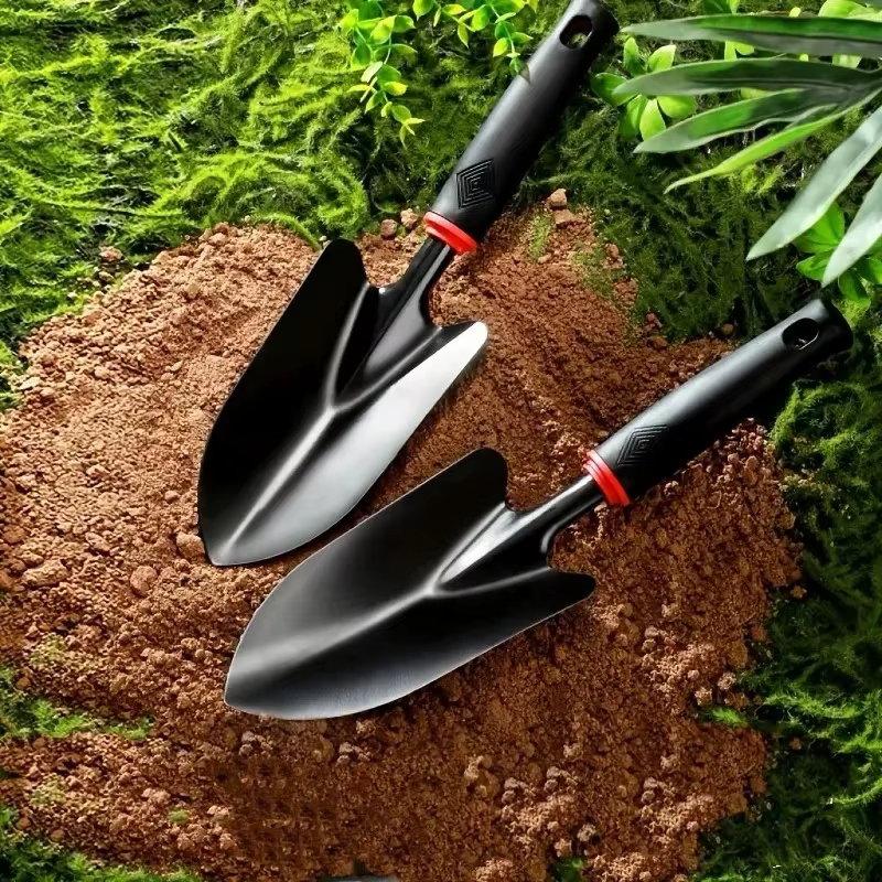 Truelle de jardin ergonomique en métal avec manche noir et garniture orange - Idéale pour planter des fleurs et des légumes