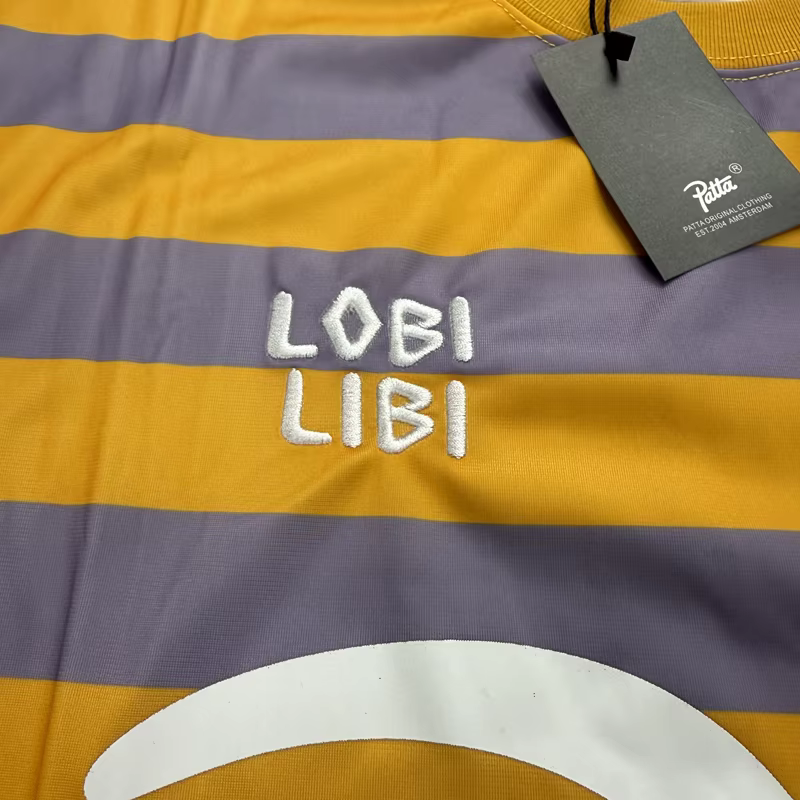 T-shirt à manches longues unisexe à col rond, motif tête de léopard brodé Patta, rayures noires et jaunes, style maillot de football ample