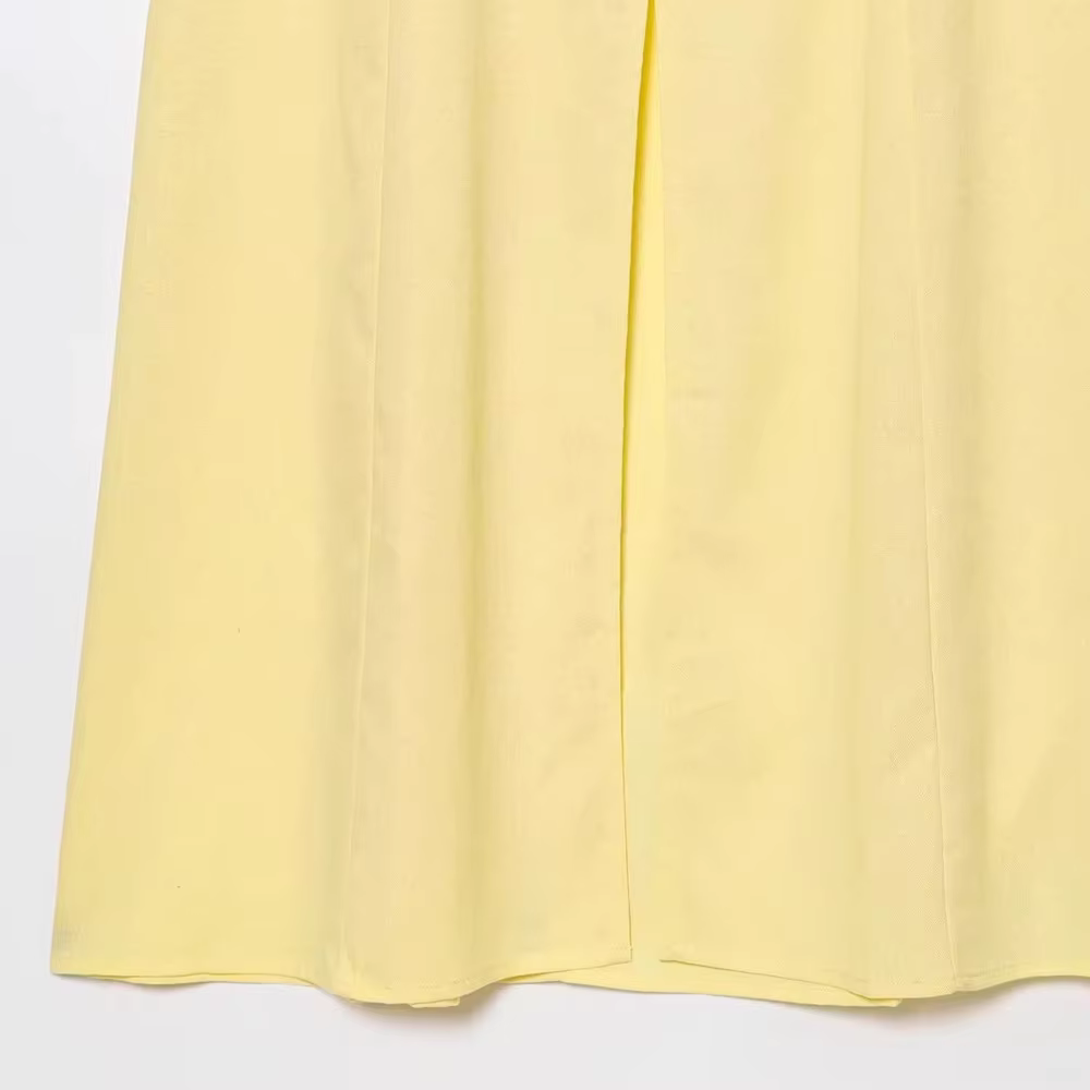 Robe longue élégante sans manches en lin uni à bouton unique