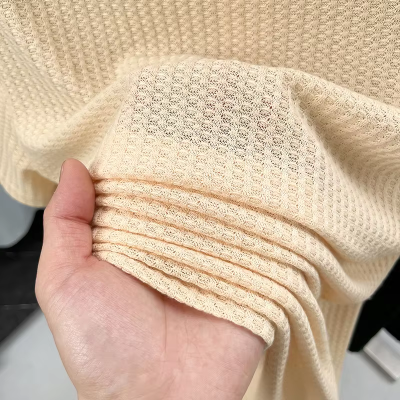Polo homme à séchage rapide en tissu gaufré nid d'abeille