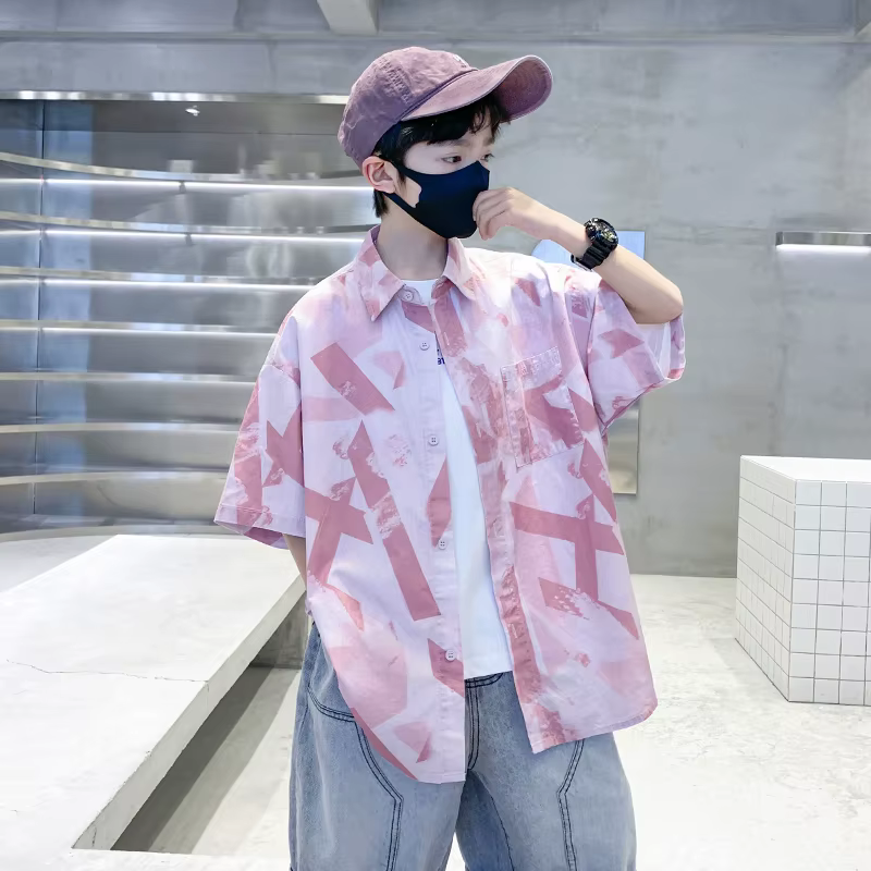 Chemise d'été élégante de couleur rose pour enfants