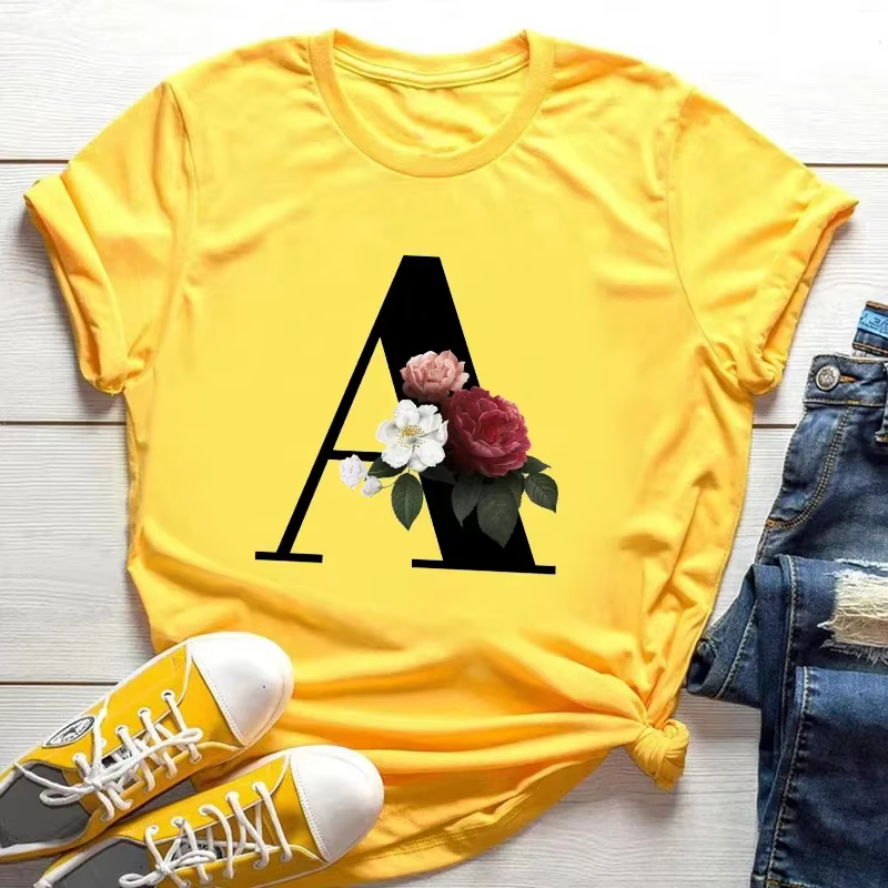 T-shirt jaune grande taille pour hommes et femmes avec imprimé tendance noir de fleurs et 26 lettres anglaises