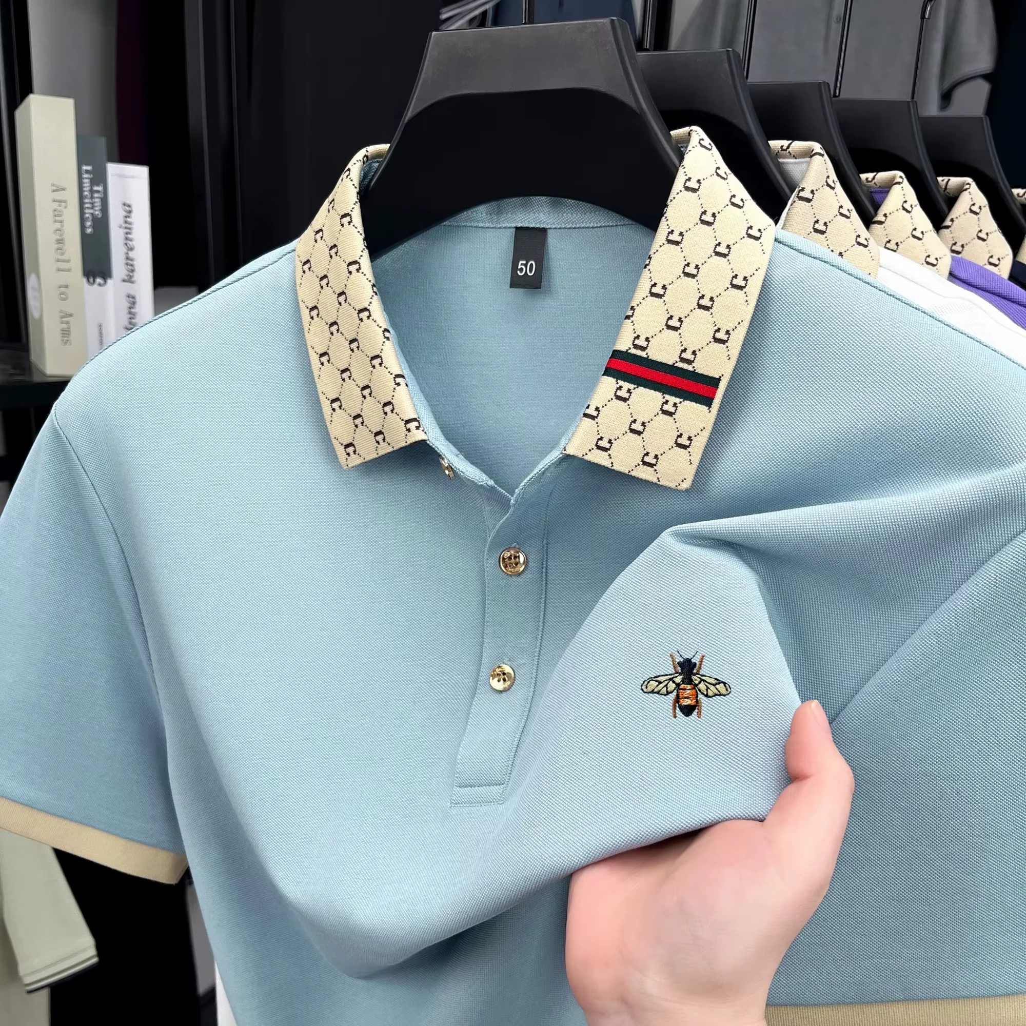Polo à manches courtes de marque de luxe légère T-shirt à revers bloqué de couleur brodée d'abeille vêtements décontractés pour hommes nouvelle collection été