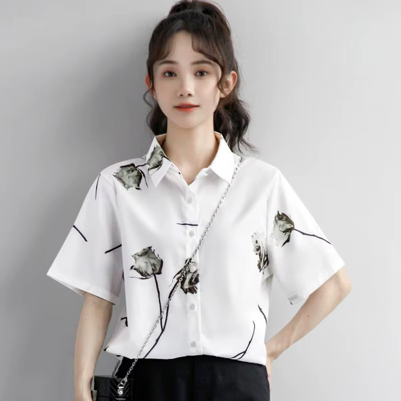 Polo blanc à manches courtes pour femmes
