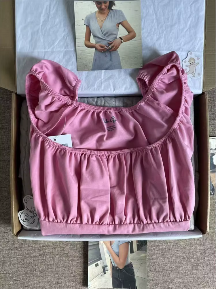 T-shirt rose en maille plissée à manches courtes pour femme