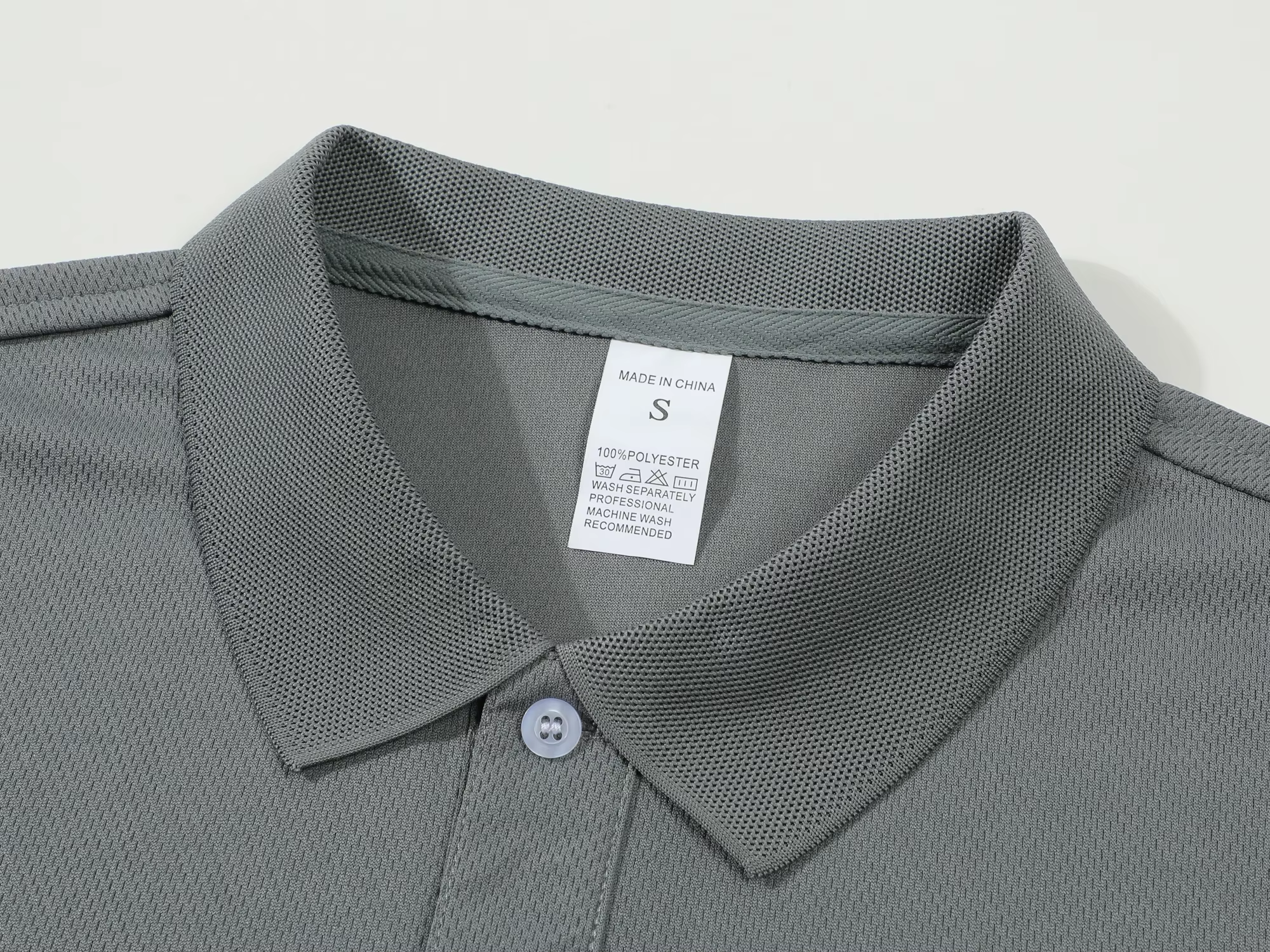 Polo homme été 2026 couleur unie à manches courtes avec col boutonné