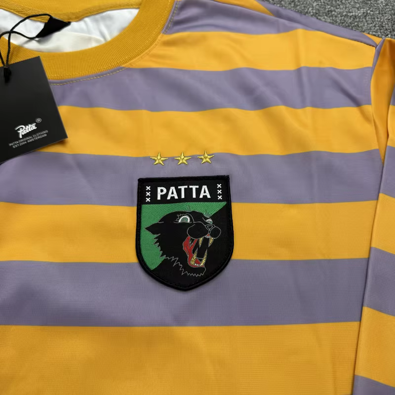 T-shirt à manches longues unisexe à col rond, motif tête de léopard brodé Patta, rayures noires et jaunes, style maillot de football ample