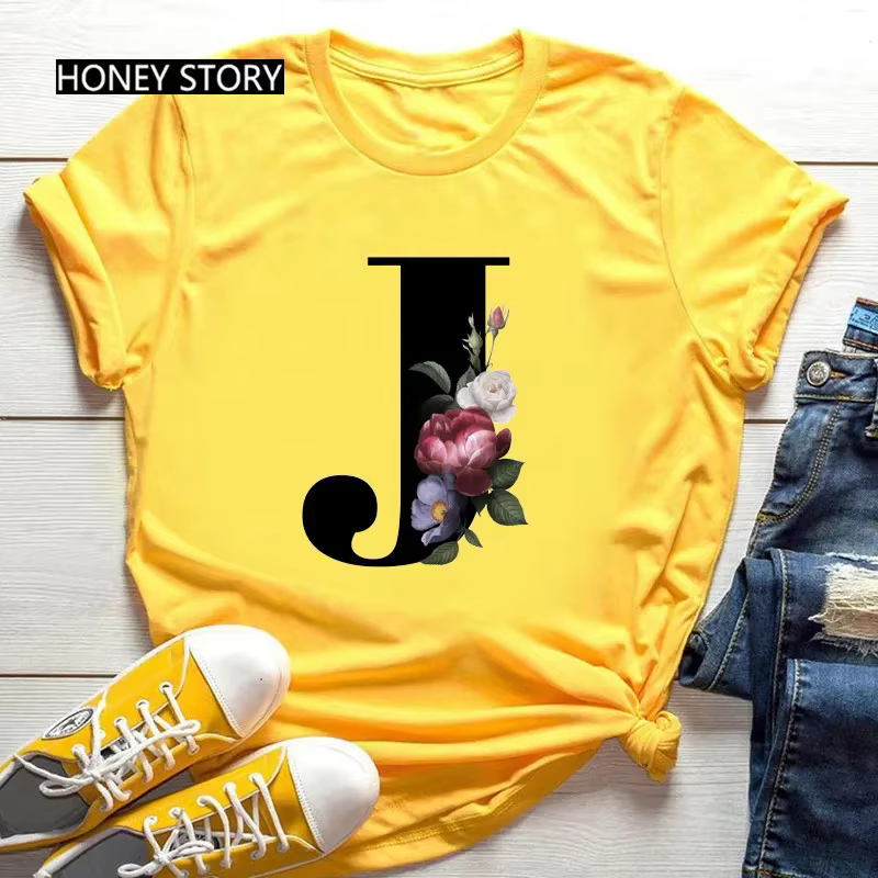 T-shirt jaune grande taille pour hommes et femmes avec imprimé tendance noir de fleurs et 26 lettres anglaises