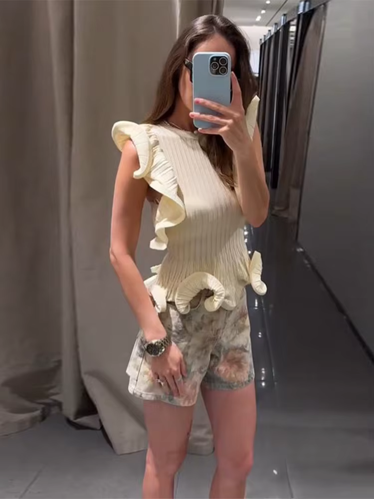 Hauts pour femmes en maille à volants sans manches